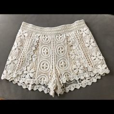 Super Cute Natural Crochet Lined Shorts. Dress Them Up With A Pair Of Heels For A Night Out Or Perfect For The Beach Over A Bathing Suit. White Lace Beachwear Bottoms, Fitted Lace Beachwear Bottoms, Crochet Shorts For Vacation, Lace Beach Bottoms With Lace Trim, Fitted Crochet Lace Bottoms For Vacation, Bohemian Fitted White Shorts, Bohemian White Fitted Shorts, White Fitted Bohemian Shorts, Summer Cotton Bottoms With Crochet Lace