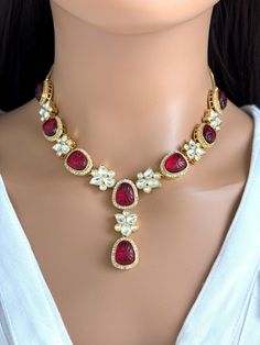 Ruby Fine Kundan Gold plated Victorian necklace, Indian Pakistani wedding jewelry, bridal jewelry, Kundan necklace, Designer necklace Regular size with adjustable chain closure  Necklace Length 16 inches  Earrings Length 1.3 inches Color, shades, texture displayed may slightly vary from the actual product due to digital image limitations. We request you to consider these minor variations. Please expect the possibility of some slight imperfections when buying handmade jewelry.  Please let me know if you have any questions. Arrives in a gift box. Thank you so much for visiting my shop. Pakistani Wedding Jewelry, Jewelry Kundan, Victorian Necklace, Necklace Indian, Designer Necklace, Kundan Necklace, Kundan Necklaces, Jewelry Bridal, Pakistani Wedding