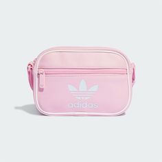 HIGH QUALITY Lorem ipsum dolor sit amet consectetur. FAST SHIPPING Lorem ipsum dolor sit amet consectetur. LOW PRICES Lorem ipsum dolor sit amet consectetur.   New Adidas Original ADICOLOR MINI AIRLINER BAG PINK / WHITE IT4832 TAKSE ADICOLOR MINI AIRLINER BAG IT4832 PINK / WHITE Features: •Condition : New •Materials: Polyurethane •Size: W 7.9"(20cm) x H 5.5"(14cm) x  D 2"(5cm) A BAG THAT GOES WHEREVER YOU DO WITH STYLE AND STREAMLINED EFFICIENCY. Classic style meets modern performance in this adidas bag. Keep daily essentials organized and close at hand, whether you're just stepping out or planning an hours-long excursion. Multiple compartments store everything you need, while the adjustable strap offers a custom fit. Subtle webbing detail elevates your everyday look. Roomy yet lightweight Adidas Bags, Adidas Shop, Backpack Sport, Across Body Bag, Nike Pink, Zipped Bag, Bum Bag, Pink Adidas, Jd Sports