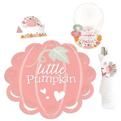 the little pumpkin party supplies are on display