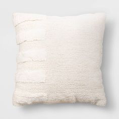 a white pillow on a gray background