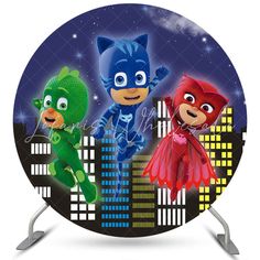 the pj masks are in front of a cityscape