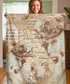 a woman holding up a poster with words all over her face and the word love on it