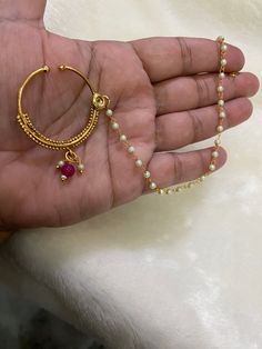 Beautiful Premium Quality Clip on Golden Nosering  * You dont need piercing to wear these noserings *For More Beautiful Collection, Check At https://www.etsy.com/shop/placeoffashion *It is a Bridal or Partywear Set. *It Will Give You a Unique and Beautiful Look  *You Can Wear This Beautiful Set At Dress or Saaree  *The Colour Combination Of This Set Is Very Unique , It can go With Any Of The Outfit *It Gives You a Unique Look For Your Special Events Like Engagement, Mehandi, Haldi, Lady Sangeet, Wedding Chandbali Nose Ring, Festive Chandbali Nose Ring For Weddings, Traditional Hoop Earrings With Tilla As A Gift, Tilla Nose Rings For Wedding Festivities, Traditional Tilla Hoop Earrings As Gift, Festive Wedding Nose Ring With Tilla, Wedding Tikka For Festivals, Round Tikka For Wedding And Festivals, Temple Jewelry Chandbali Nose Rings For Wedding