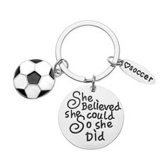 a keychain with a soccer ball and the words she belved she could't so she did