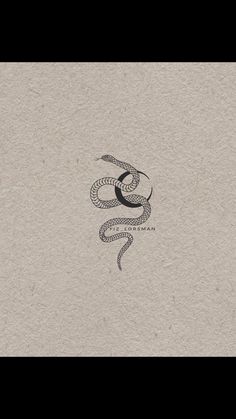 an image of a snake that is on the side of a piece of paper,