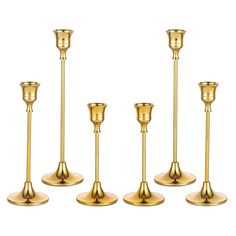 PRICES MAY VARY. SLEEK & SHINY: sophisticated surface treated, this brass candlestick holder set is sleek, shiny, will be an eye-catching decorative piece on your table or fireplace mantle or shelf FUN & ELEGANT CANDLE HOLDER: exquisite candle stick long holder, stemmed and vintage design, looks elegant and fits various occasions, like daily home interior decoration, parties, Halloween decor, home festive dinning table decorations EASY TO GO WITH various home interior: vintage candle holder but Gold Candle Stick With Tapered Candle, Gold Candle Sticks On Mantle, Gold Candles Holder, Brass Cabdlesticks, Wedding Decorations Gold, Gold Candle Stick Holders, Gold Taper Candle Holders, Gold Taper Candles, Gold Candlestick Holders