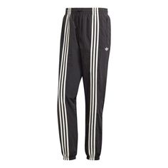 adidas Hack Pant 'Black' HZ0701 Three Stripes Relaxed Fit Sportswear Pants, Relaxed Fit Three Stripes Sportswear Pants, Relaxed Fit Sportswear Pants With Three Stripes, Relaxed Fit Sportswear Bottoms With Three Stripes, Adidas Sportswear Pants For Spring, Casual Adidas Activewear For Spring, Adidas Athleisure Pants With Logo, Adidas Relaxed Fit Sport Bottoms, Adidas Relaxed Fit Sports Bottoms