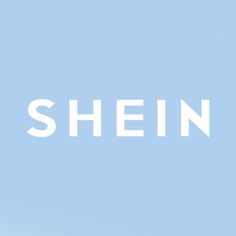 an airplane flying in the sky with the word shein on it