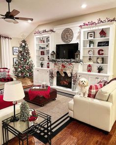 a living room filled with furniture and a christmas tree