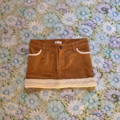 This Is Such A Beautiful Skirt By The Japanese Brand Liz Lisa, Made In The Early 2000’s / Y2k Era. The Skirt Has A Deep Tan Corduroy All Over With Sherpa Accents On All Of The Pockets And The Bottom. This Skirt Has Little To No Stretch, And Is Marked A Size Free. Please See Measurements Below! Measurements (Taken Flat) Waist - 14” Length - 11” Early 2000’s, Y2k Era, Beautiful Skirt, Liz Lisa, Beautiful Skirts, Mini Skirt, Womens Skirt, Mini Skirts, Skirt