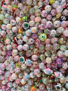 there is a large amount of beads in the shape of animals