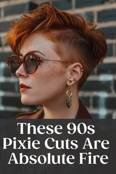 Stylish person with a 90s inspired pixie haircut wearing round sunglasses and statement earrings against a brick wall backdrop. Hair Pins Hairstyles Short Hair, 90s Style Icons, Classic Pixie