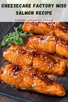 grilled salmon fillets on a wooden cutting board with text overlay that reads how to make cheesecake factory miso salmon recipe