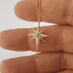 Solid Gold North Star Necklace, Dainty Pole Star Charm Necklace For Birthday Gift, Northern Star Pendant For Her, Jewelry For Christmas Gift This necklace is handmade and produced with 10k 14k 18k solid gold according to your preference. Material : 10kt 14kt 18kt Solid Gold Gold Color : Yellow Gold, White Gold, Rose Gold Gemstone : Cubic Zirconia Pendant Sizes: Height: 0.87 inches ( 22 mm) Width: 0.67 inches ( 17 mm) We have 3 types solid gold chain options: Type1 Chain (0.85mm thick) Type2 Chai Northern Star Necklace, Celestial Star-shaped Necklace For Party, Celestial Star Necklace For Party, Gold Star Charm Jewelry For Birthday, Gold Necklaces With Star Charm For Birthday, Gold Star Necklace For Birthday Gift, Gold Star Necklaces For Birthday Gift, Star-shaped Jewelry For Christmas Gift, Christmas Star Charm Jewelry Gift