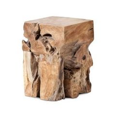 a piece of wood that has been carved into a tree stump and is sitting on a white background