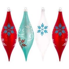 three red and one blue christmas ornaments are in the shape of snowflakes