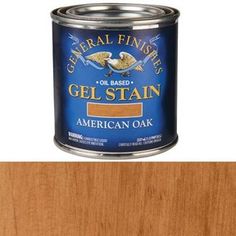 a can of gray paint sitting on top of a table