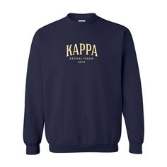 a navy sweatshirt with the phi beta logo in gold and white letters on it