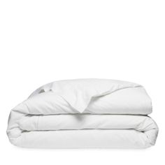 two white pillows stacked on top of each other