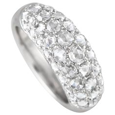 Dazzle a style-savvy woman with the gorgeous sparkle of this ring. The domed band is crafted in platinum, and its top half is covered with round diamonds of varying sizes. A total of 1.88 carats of diamonds bring a stunning shine to this ring. The ring's top dimensions measure 17mm by 7mm.This Platinum 1.88ct Diamond Cluster Dome Ring is offered in estate condition and presented in a gift box. Dome Ring, Style Savvy, Modern Ring, Domed Ring, Diamond Cluster, Modern Jewelry, Round Diamonds, Band Rings, Jewelry Watches