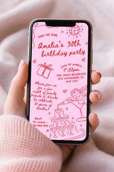 a person holding an iphone in their hand with the birthday party app on it's screen