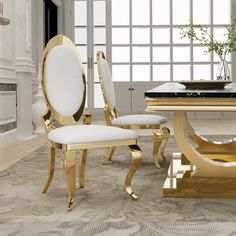 an elegant dining room with white and gold furniture