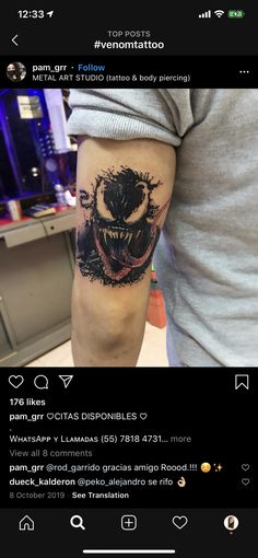 a man's arm with a tattoo on it and an image of a gorilla