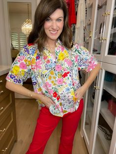 Bring a pop of color and a little whimsy to your closet with the Best and Brightest Floral Top. This easy-fit top showcases a playful floral print, collared neckline, and puffed sleeves. Pair it with your colored denim (or traditional blue denim) for a fun and versatile look. Perfect for teachers and office gals, this every day top is sure to help you stand out from the crowd. Top measures 24" in length. Bust measures 22" from underarm seam to seam. Measurements taken on a small. Fabric has no s Deodorant Stains, Scarf Hat, Scarf Jewelry, Puffed Sleeves, Colored Denim, Floral Top, Hat Hairstyles, Workout Tops, Sales Gifts