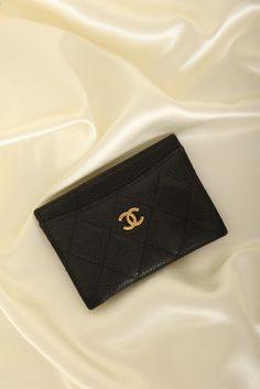 CONDITION: VERY GOOD , dustbag, box, and care booklet.??¨ This cute little Chanel cardholder in black caviar with gold hardware adds the perfect touch of sleekness and style to your wardrobe! Includes three card slots and a pocket in the middle. Simple, yet a stylish statement.??¨~ Beth Crafted in??¨2021 4.5" L x 3" H??¨ Please note: Slight discoloration on hardware.??¨ In order to meet the current demand and given the??¨nature of sourcing inventory, all sales are final. Please be sure to review all pictures and ask any questions prior to making a purchase! To prevent any form of fraud, I??¨keep video records of??¨myself??¨packaging??¨and dropping off each order, and??¨all??¨orders ship with??¨tracking and??¨signature??¨confirmation. Please ensure your shipping address is correct as we are Chanel Cardholder, Girl Backpacks School, Chanel Wallet, Chanel Caviar, Black Caviar, Handbag Wallet, Chic Me, Wallet Accessories, Girl Backpacks