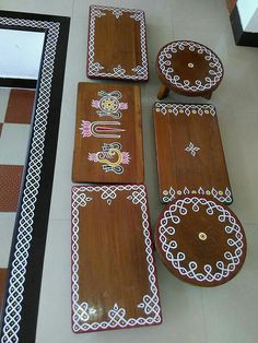 decorative wooden trays and plates on the floor