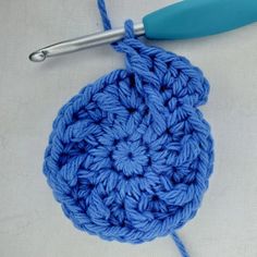 the crochet ball is being worked on