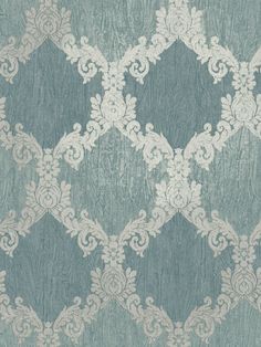 a blue and white wallpaper with an intricate design on it's surface,