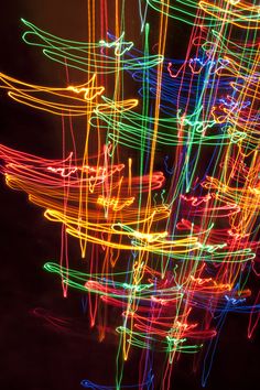 an abstract photo of colorful lights in the dark