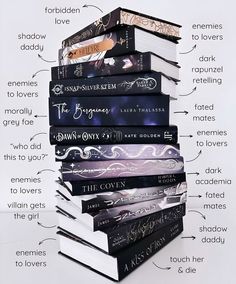 a stack of books sitting on top of each other in front of a white background