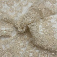 Cleo is a floral lace fabric with pearls attached to it giving the fabric an extra-ordinary and luxury look. This fabric is perfect as finishing for dresses and evening gowns. Composition: CO/PL Width: 55 cm Colour: ecru Pattern: floral Weight: 450 gr/m2 Lace With Pearls, Floral Lace Fabric, Luxury Look, Pattern Floral, Lace Fabric, Floral Lace, Evening Gowns, Composition, Lace