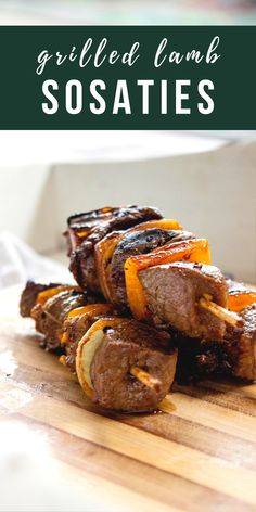 grilled lamb sosaties on a cutting board with the title text overlay