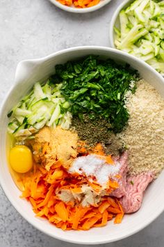 two bowls filled with different types of food on top of a white countertop next to each other