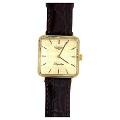 Vintage 18ct Yellow Gold Longines Square Flagship Watch Vintage 18ct Yellow Gold Longines Square Flagship Watch With Longines buckle on a leather strap. Additional Information: Case Size: 29 x 24mm Lug Width: 18 mm Case Material: 18ct Strap Width: 18 mm Case Thickness: 4mm In Perfect Working Condition Total Weight: 55.8g SMS4114 Watch Vintage, Vintage Watches, Wrist Watch, Leather Straps, Jewelry Watches, Buckle, Yellow Gold, Band, Bracelet