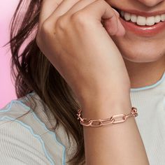 Wear your mantra on your wrist. Our 14k rose gold-plated Pandora ME Medium-Link Chain Bracelet holds endless styling possibilities. The bracelet features three openable links, designed with a grooved surface to set them apart, styling links and a carabiner clasp closure. First customise your link chain: one set of interlocking styling links can be swapped out between each openable link for four small interlocking links, a styling double link or one styling link – keep the original length or adjust it to suit you. Once you’ve curated your link chains, remix your look with up to two meaningful medallion charms or up to eight mini dangle charms on each openable link, or with one medallion charm per styling link to show the world what you're about. Please note this item is only compatible with Everyday Rose Gold Box Chain Jewelry, Rose Gold Box Chain Jewelry For Everyday, Rose Gold Jewelry With Jubilee Bracelet, Luxury Rose Gold Bracelets For Everyday, Luxury Rose Gold Bracelet With Rectangular Links, Luxury Rose Gold Chain Link Bracelet, Luxury Rose Gold Chain Bracelet For Everyday, Luxury Everyday Rose Gold Chain Bracelet, Everyday Luxury Rose Gold Chain Bracelet