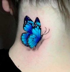 a blue butterfly tattoo on the neck