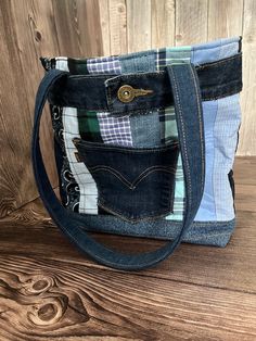 a purse made out of jeans on top of a wooden table