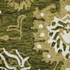 This lovely area rug in a classic floral pattern will be an exceptional addition to your home. It is hand-crafted with pride in India using 100% New Zealand wool, providing the highest level of comfort underfoot. Featuring a cotton backing to help prevent sliding and shifting, this rug is perfect for bedrooms, living rooms, and dining rooms alike. Olive Green Rug, Hooked Wool, Green Sofa, Framed Quotes, Vintage Type, Wool Rugs, Hand Tufted Rugs, Green Rug, Tufted Rug