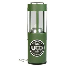 a green lantern with two silver balls in the bottom and one light on it's side