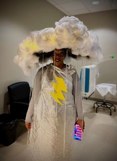 a woman with a cloud on her head