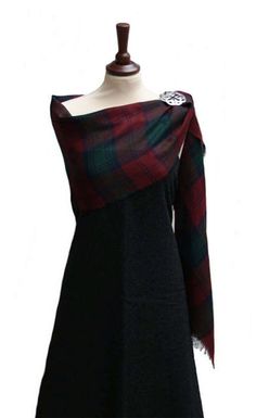 - Made in Scotland - Medium Weight (13oz) Wool - Premium Wool Tartan - Measures Approx. 27″ x 72″ These stoles are made in Scotland from medium weight (13oz) premium wool tartan. They are a great way to represent your heritage in any setting. The stole is also a perfect way to add a bit of warmth or elegance to any ladies attire. It's a lovely accent piece to display your tartan with any casual or formal wear. 27″ wide by 72″ long. Tartan Bridesmaid Shawl, Dress Stuart Tartan, Black Dress With Tartan Sash, Tartan Wedding Dress Scotland, Tartan Bridal Shawl, Flannel Wedding Dress Plaid, Scottish Wedding Dress Sash, Mackenzie Tartan, Tartan Sash