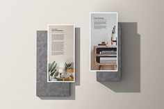 two brochures are placed next to each other on the wall, one has a plant in it