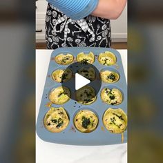 an image of a child making muffins with spinach and cheese in the middle