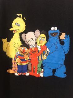 an image of sesame street characters on a black t - shirt