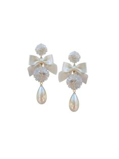 pre-order: embellished mother of pearl + ivory bow – Nicola Bathie Nicola Bathie Mclaughlin, Nicola Bathie, Silk Bow, Pearl Design, Gold Silk, Bow Earrings, Accessories Jewelry Earrings, Wedding Earrings, Bridal Earrings